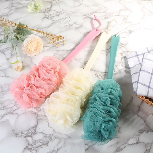 brosse exfoliante a long manche couleurs