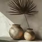 Peinture feuille dans pot et un pot vide