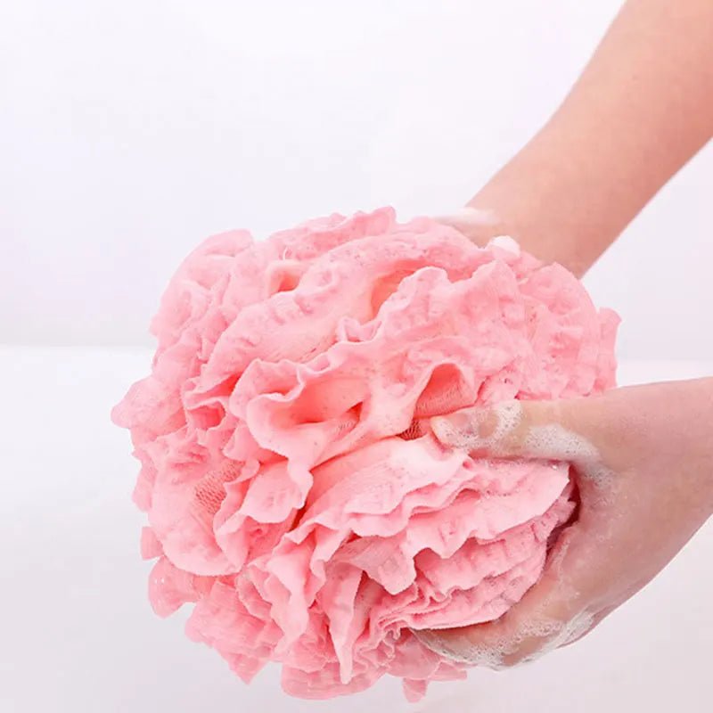 boule exfoliante rose mousseuse