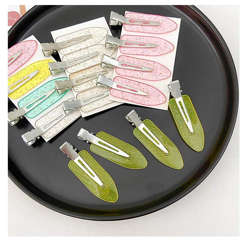 pince-a-cheveux-4-brillants-transparents-choix-plat-noir