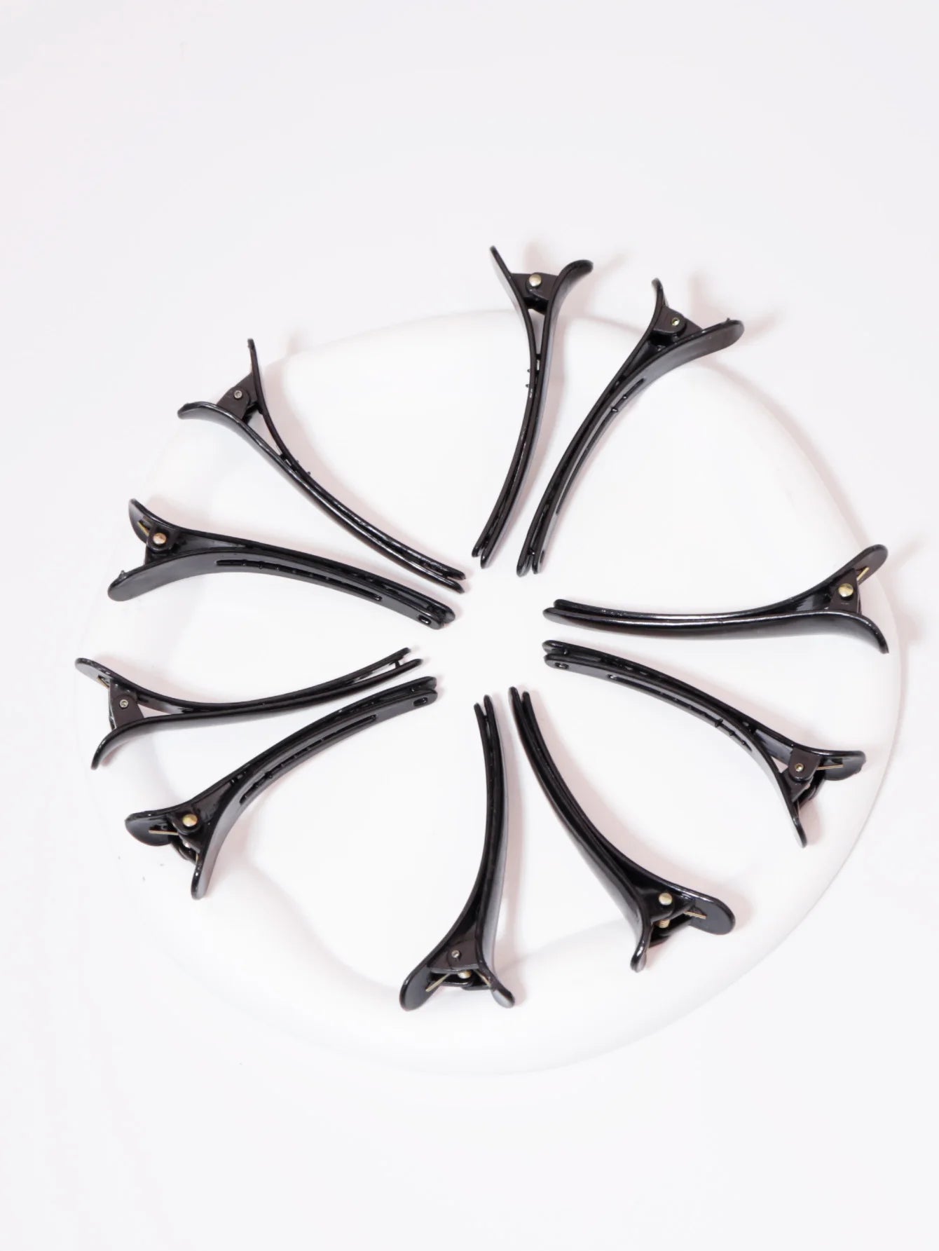 pince a cheveux noir en cercle