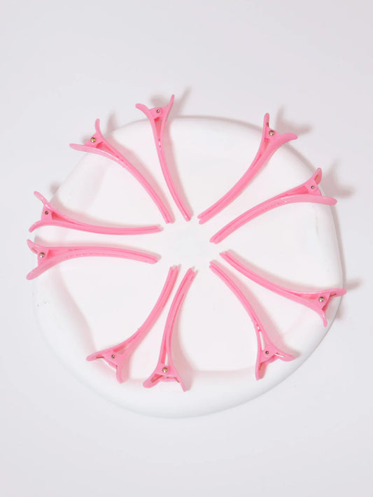 pince a cheveux rose en cercle