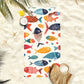 serviette de poissons sur sable sac en coin
