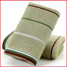 serviette de visage seulement verte pliee