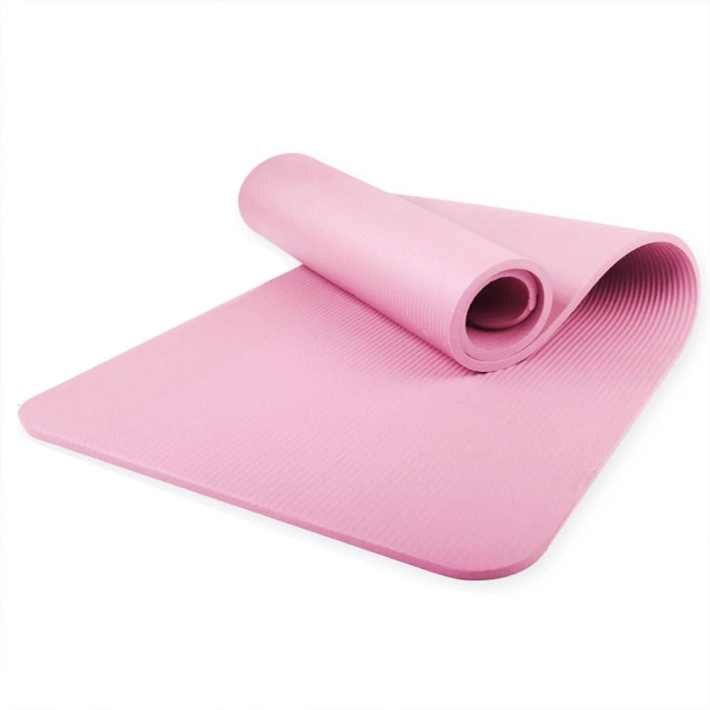 tapis de yoga antidérapant rose semi-roule et etendu